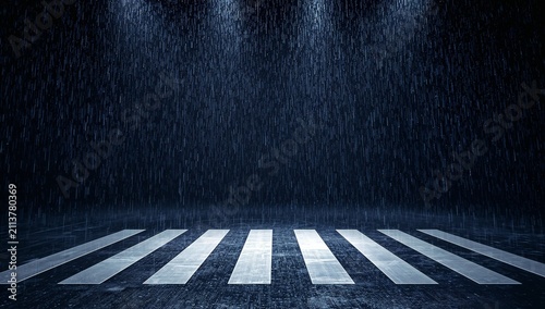 Rain Falls on a Dark Street With a Crosswalk Under Bright Lights