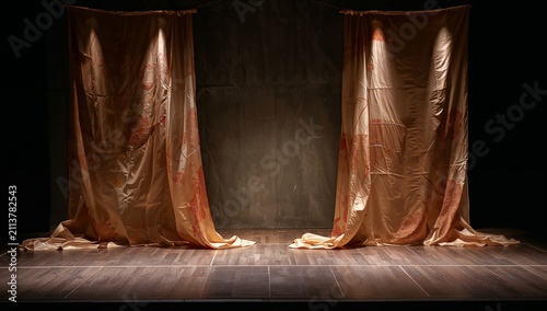 Stage Setup With Draped Fabric in a Theater Space