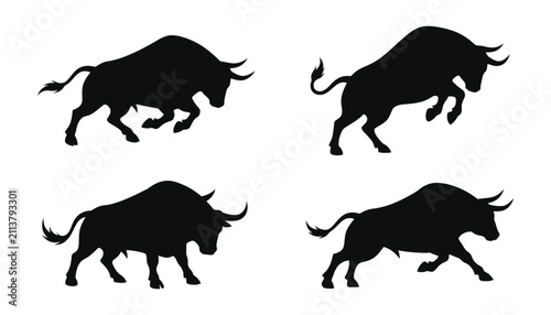 A collection of black bull silhouettes in various aggressive and charging poses isolated on a plain white background
