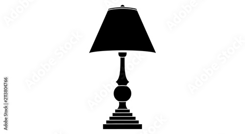 Konstfotografi A black silhouette of a classic table lamp with a decorative base and lampshade