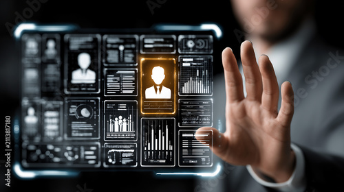 Futuristic human resources dashboard with digital profile interface, businessman managing employee data on virtual screen, recruitment and talent management technology