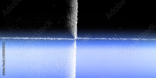 Bild auf Leinwand Abstract glowing cross light effect on dark blue surface with abstract backgroun
