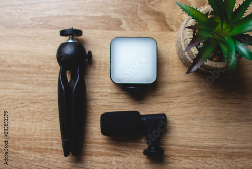 фотографія Vlogging and content creation accessories, including a compact tripod, led light
