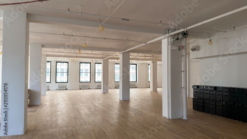 Spacious Commercial Loft Interior with Open Floor Plan and Hardwood Flooring
