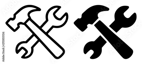 Black and white crossed hammer and wrench icons set representing tools and repair concepts on transparent background
