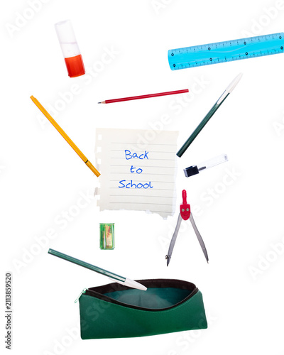 School supplies falling into a pencil case.