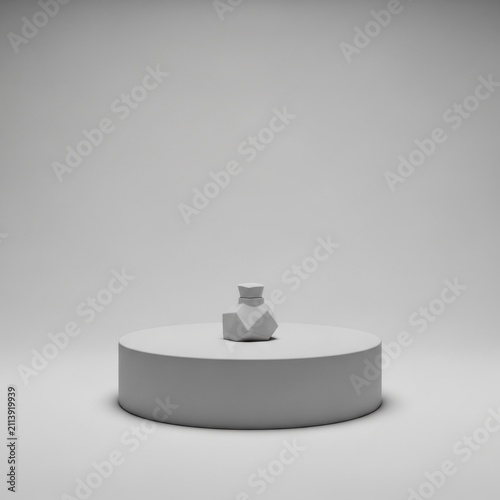 Minimalist low poly perfume bottle rests on a circular pedestal against a plain gray background.