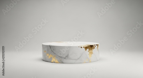 Marble pedestal with golden details serves as a minimalist platform for product presentation.