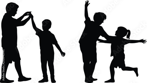 Silhouette of adults and children holding hands in a line
