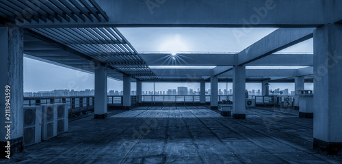 Quadro su tela Urban Rooftop Perspective in Blue Hues with City Skyline