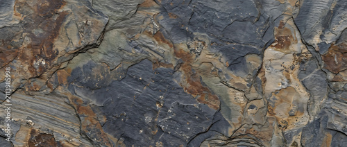 Granite stone texture featuring cool blue gray tones with subtle natural mottling creates a modern elegant background for interior design projects