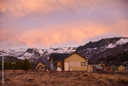 Winter sunrise over Caviahue village with snow covered Andean mountains, in Neuquen, Argentina