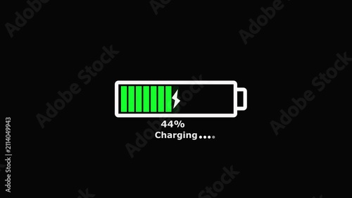A white outlined battery showing hundred  percent charge with a lightning bolt symbol and the text Charging appearing a black background.