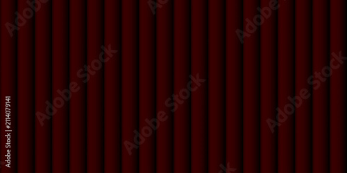 Фотография Dark red velvet curtain background with vertical folds and subtle shadows for theater stage
