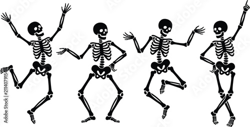 Fotografie Group of four happy skeletons dancing together in black and white