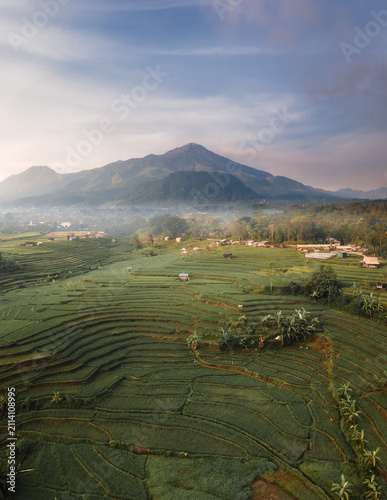 Obraz na płótnie Mountain Landscape at Sunrise with Morning Mist and Golden Light