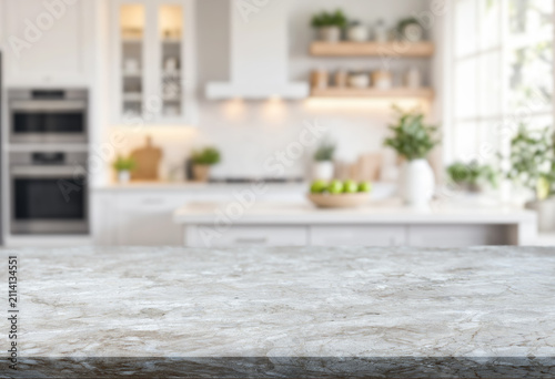Canvastavla blurred interior of a white kitchen on background and empty marble table on fore