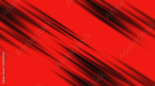 Abstract red background with diagonal black motion lines and grain texture