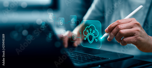 Cybersecurity protection framework concept with business professional using laptop and stylus showing cloud security workflow threat detection authentication monitoring and data protection