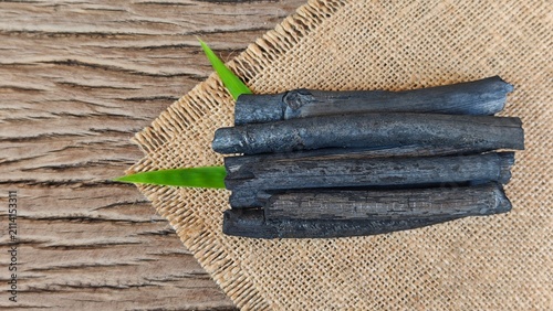 Принти на полотні Bamboo charcoal stick on wooden board.