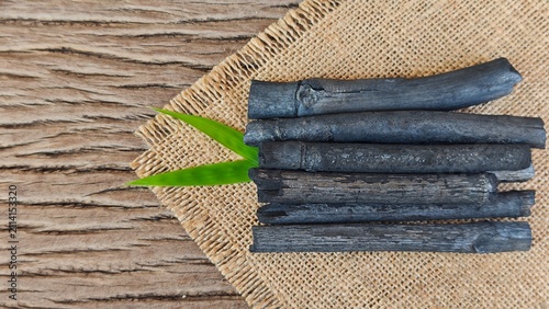 Принти на полотні Bamboo charcoal stick on wooden board.