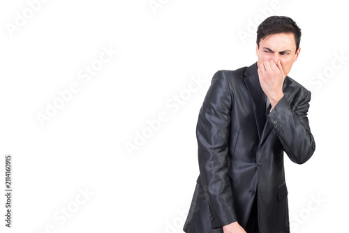 Canvastavla Man in elegant suit pinching nose in studio