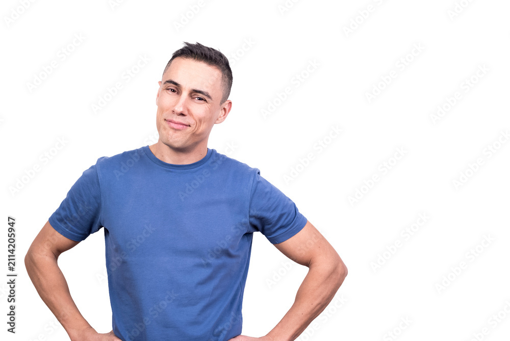 Obraz premium Man smiling relaxed with his hands on hip