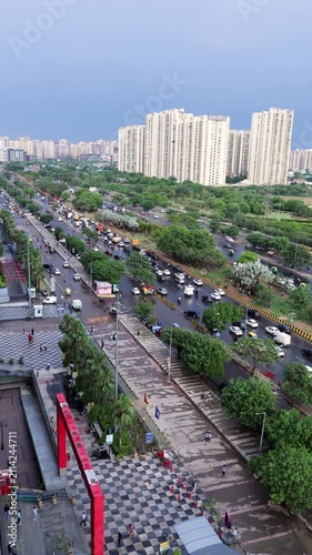Aerial view of Delhi NCR cityscape. Urban traffic and modern residential towers in Noida.