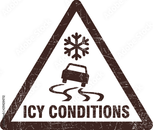 Brown icy conditions warning sign with snowflake and car triangle