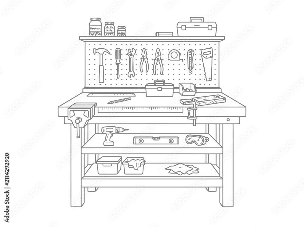 Fototapeta premium Workbench with various hand tools and power equipment in workshop setting