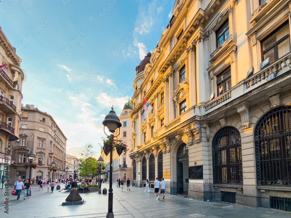 Fototapeta premium Pedestrians exploring historic Knez Mihailova Street in central Belgrade