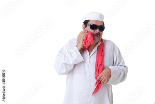 Politician wiping his face 