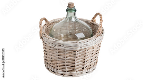 Foto Large vintage glass carboy bottle inside white wicker basket isolated on transpa