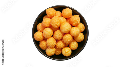 Obraz na plátně Orange cheese puffs in black bowl