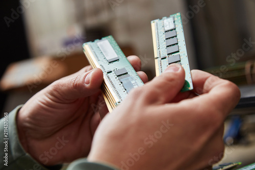 Hand holding used RAM