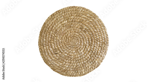 Round woven straw placemat with spiral pattern