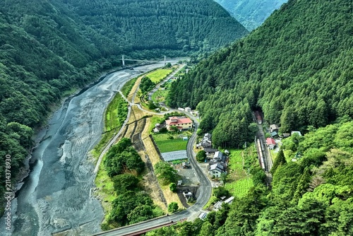 Obraz na plátně Aerial drone photo of river valley and mountain landscape in Kawanehon, Shizuoka