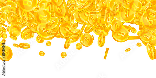 Thai baht coins falling. Gold scattered THB