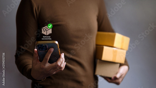 Courier Holding Smartphone and Parcel Boxes with Delivered Successfully Icon for E-Commerce Concept