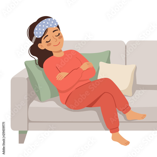 Woman resting with sleep mask on forehead in cozy living room  