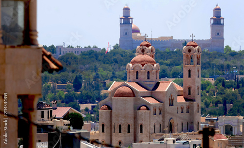 Принти на полотні A mosque and a church represent religious coexistence in western Amman