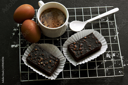 delicious homemade chocolate brownies  , arranged on wire cooling rack. Taken on a white background.