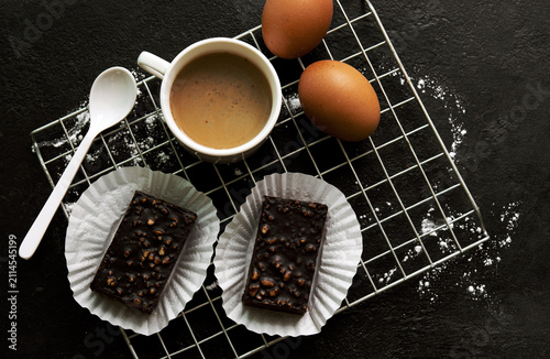 delicious homemade chocolate brownies  , arranged on wire cooling rack. Taken on a white background.