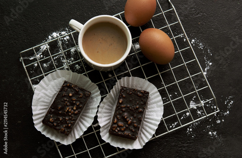 delicious homemade chocolate brownies  , arranged on wire cooling rack. Taken on a white background.