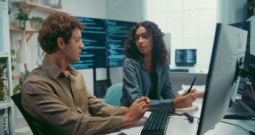Diverse team software developer discuss AI coding and project strategy at office. Creative startup group brainstorming, Mentor code review training, Digital communication innovation strategy concept.