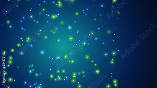 Abstract blue background with floating glowing light particles