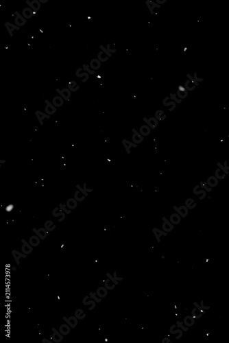 Quadro su tela Light snowfall on black background, visual overlay layer for compositing