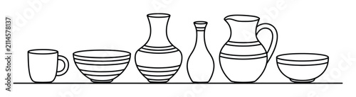 Foto Una colección de varios utensilios de cocina y vasijas de cerámica en estilo de