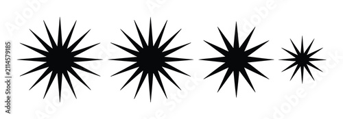Принти на полотні Un conjunto de cuatro estrellas negras de diferentes tamaños sobre fondo blanco
