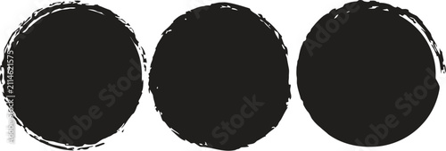 Three black circles with rough hand drawn edges isolated on a plain white background for graphic design projects
